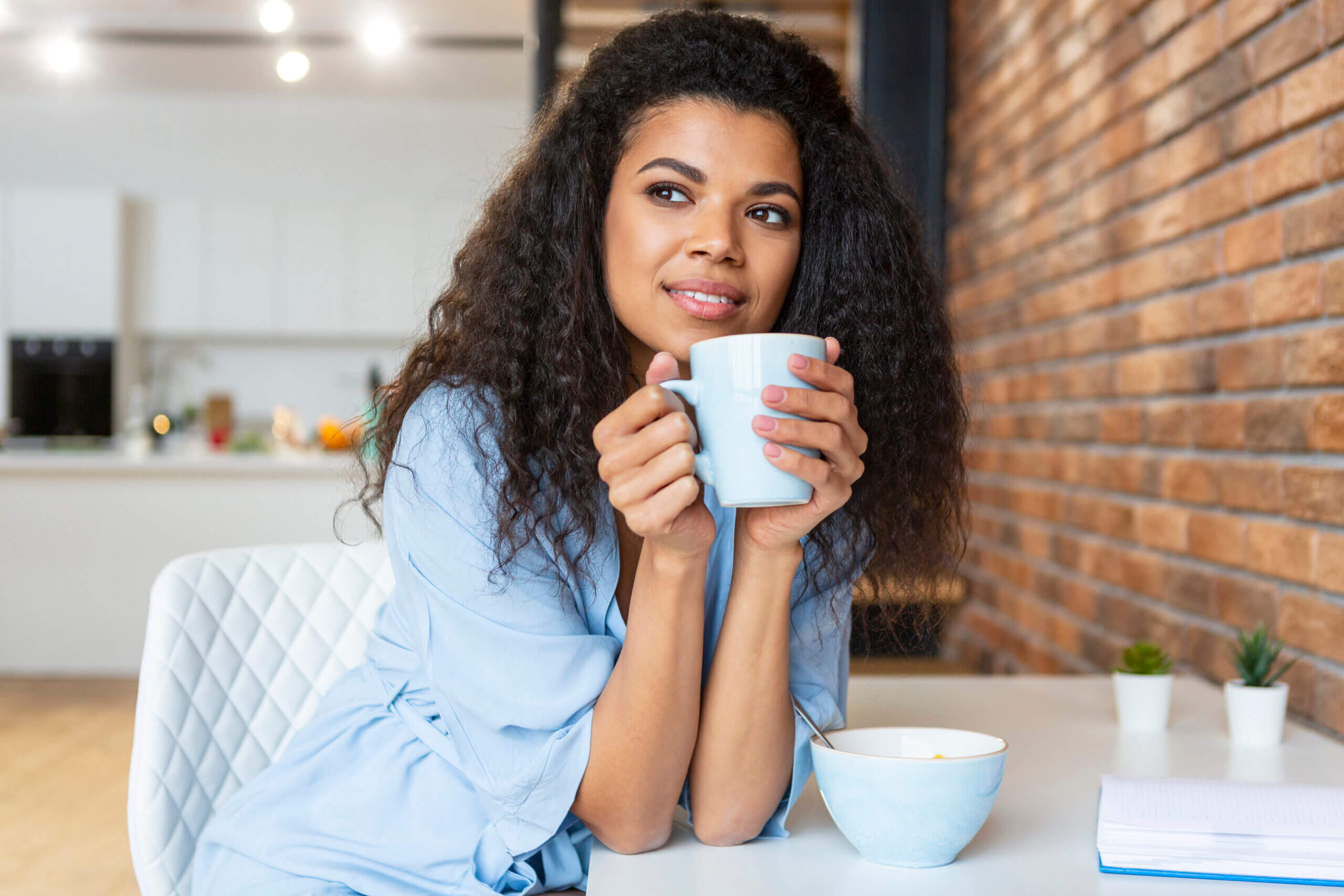 young woman having cup coffee